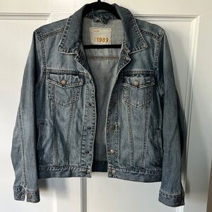 Denim jacket fits women size S/M